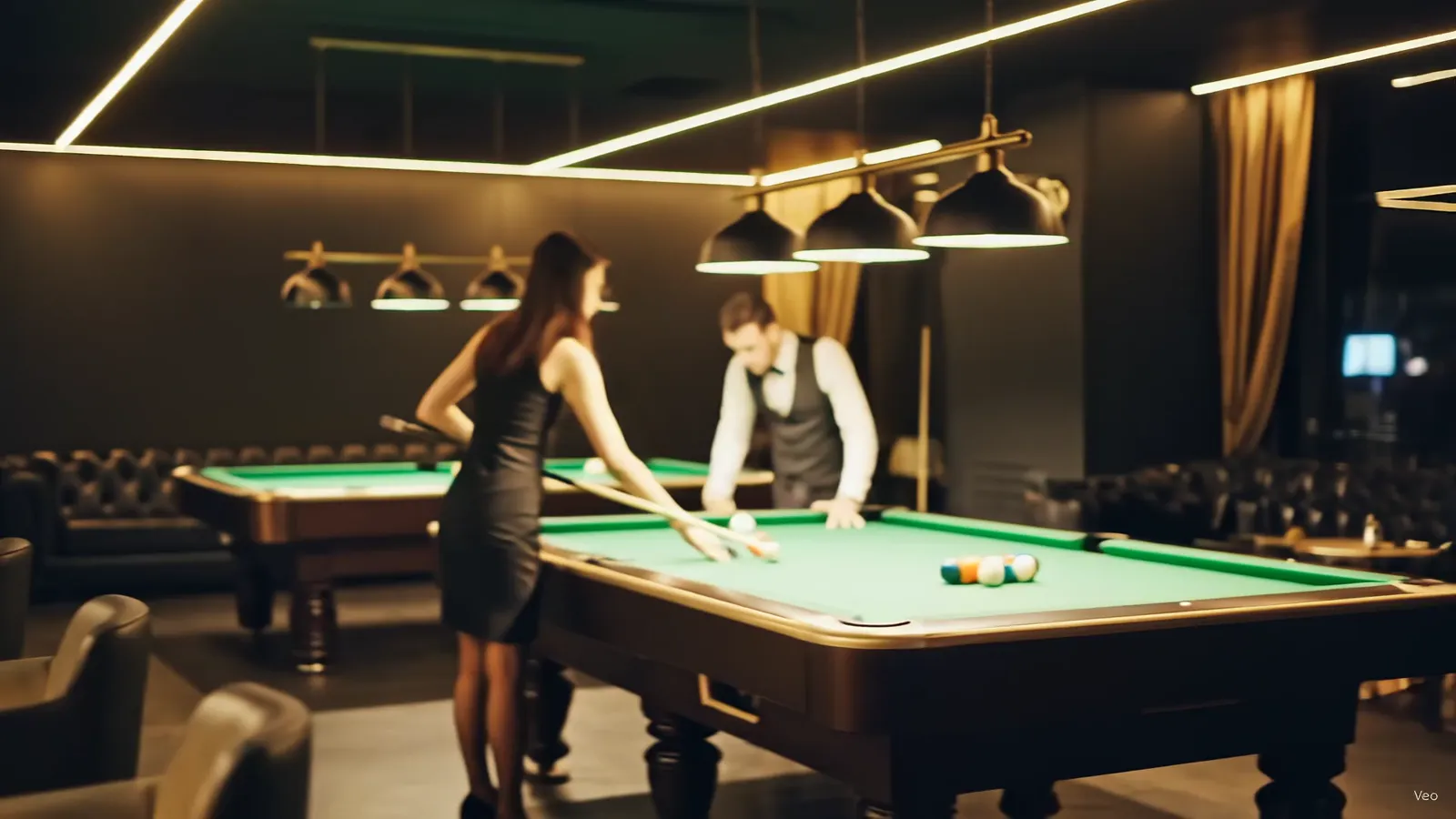 Snooker table under gold ceiling lights